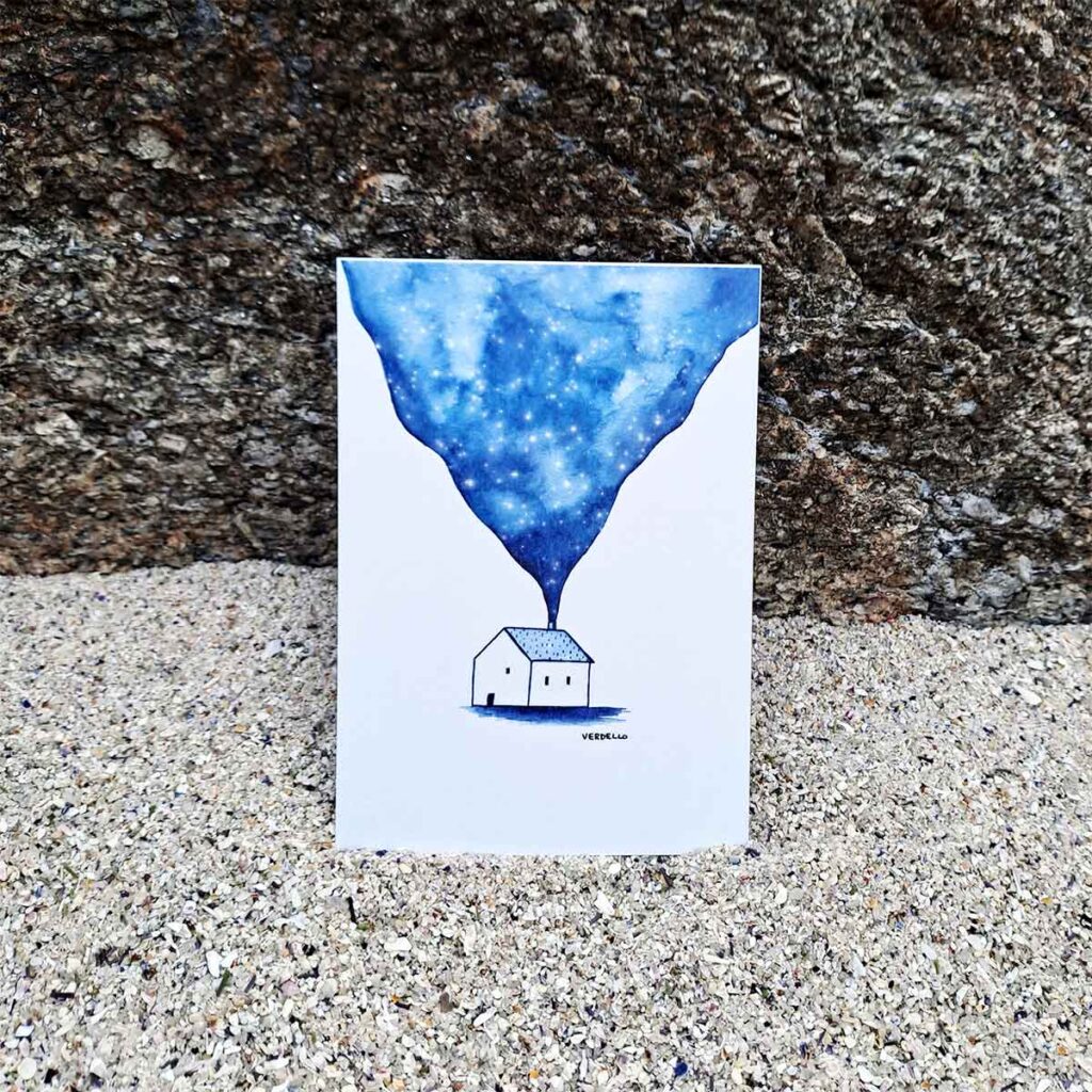 Postal de casa con humo de estrellas