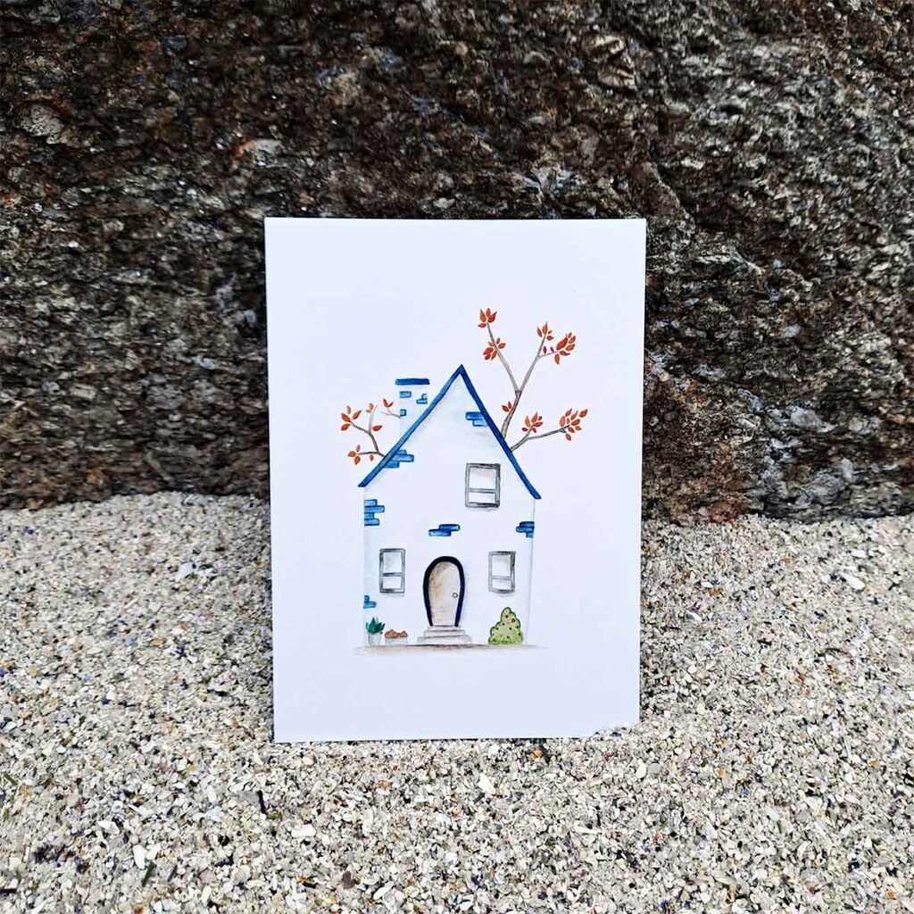 Postal casa azul y blanca